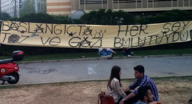 Protest banner near Gezi Park - "In the beginning, everything was a cloud of dust and gas" - photo by the author.